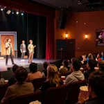 Experience the excitement of rokok88's live theatre performances with engaging actors and a captivated audience.